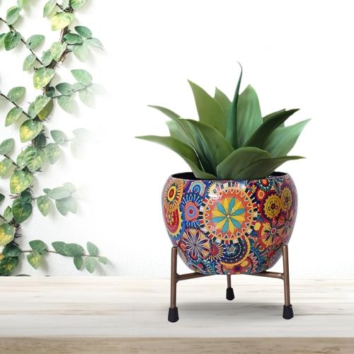 Colorful Mandala design Vase Planter Pot with green plant and sturdy iron stand, decorative indoor planter for home and garden décor.