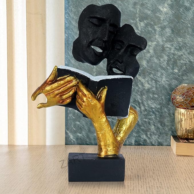 Handcrafted Art Face Sculpture in black and golden finish, featuring expressive faces with book design – modern decorative figurine for home and office décor.