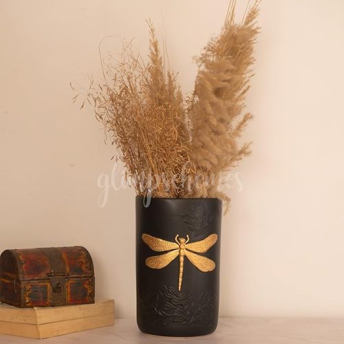 Black ceramic Homes Dragonfly Vase with golden dragonfly design, styled with dried pampas grass