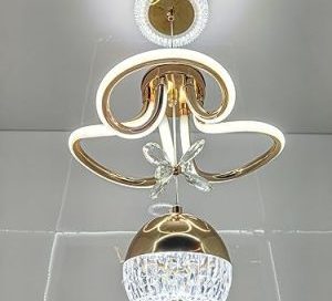 A luxurious gold and crystal ceiling fixture with curved LED light sources, designed as a statement modern pendant lamps.