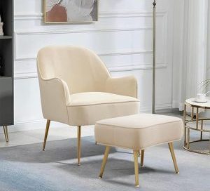 A comfortable beige velvet accent chair with gold metal legs and a matching ottoman, styled as a single chair sofa.